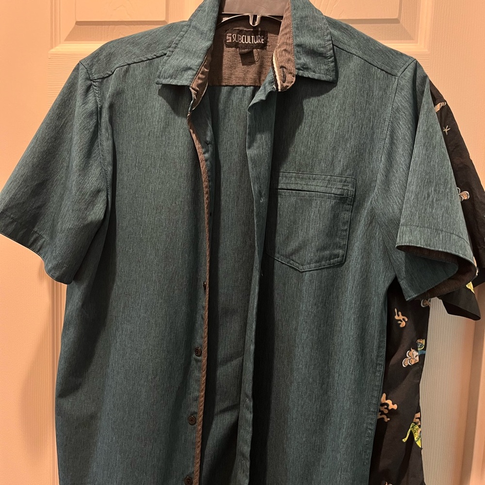 Awesome sports material dark teal button down, liquid wicks right off it!
